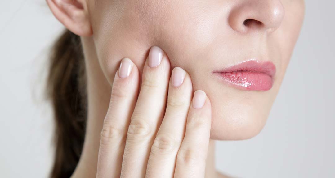 TMJ Jaw Pain Woman with TMJ Jaw Pain